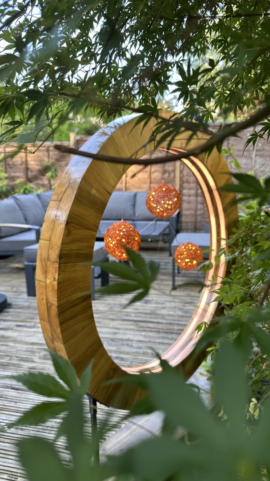 Garden Ring Sculpture illuminated at night